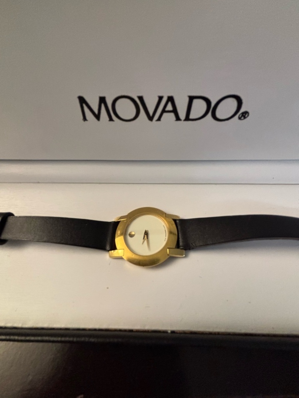 Movado gold tone women’s watch with black leather strap. - Picture 5 of 5